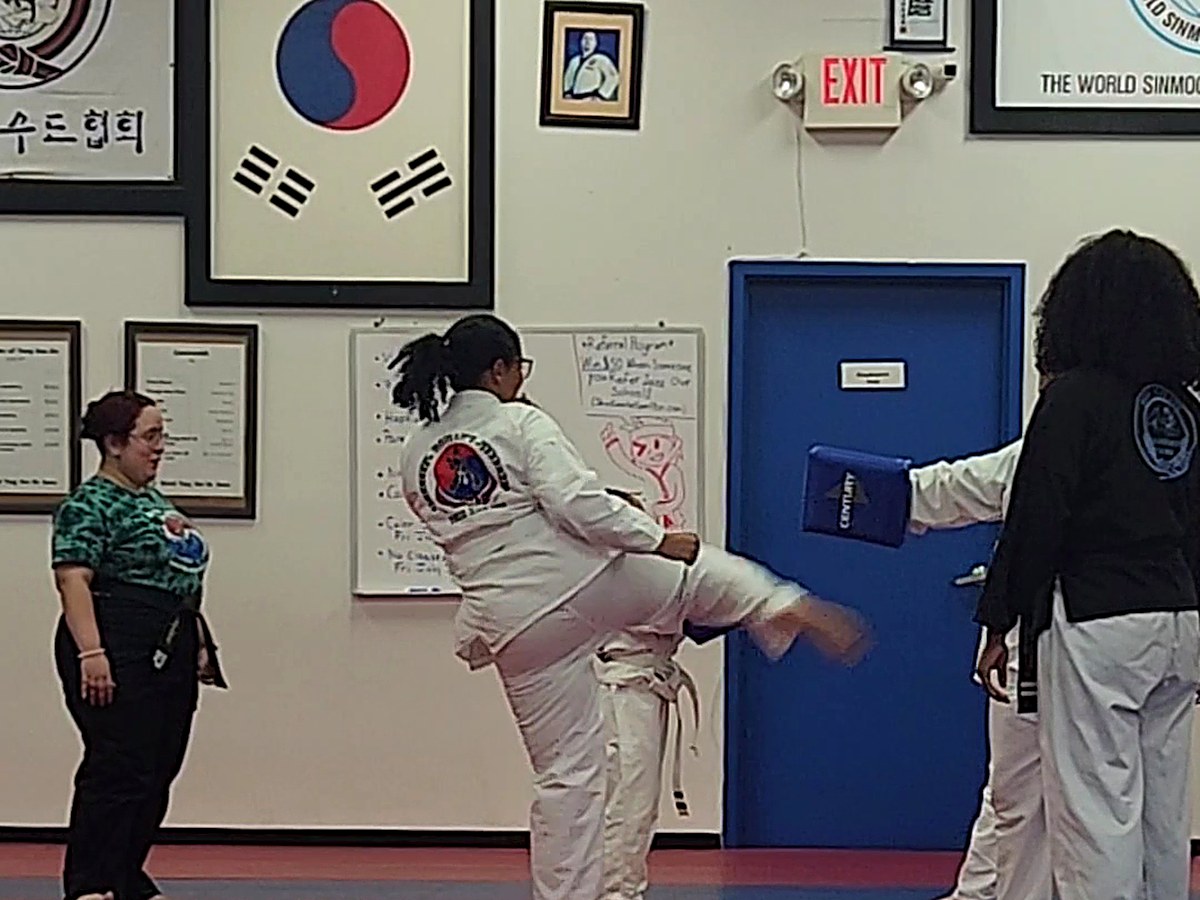Is Your Child students practicing drills during class at Roman's Shin Karate in Hamilton