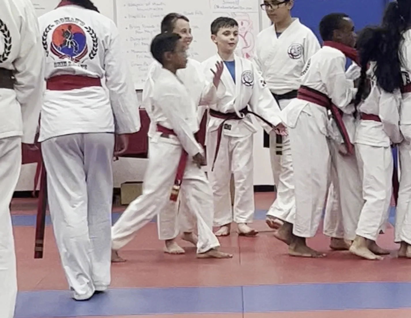 The One Hour students practicing drills during class at Roman's Shin Karate in Hamilton